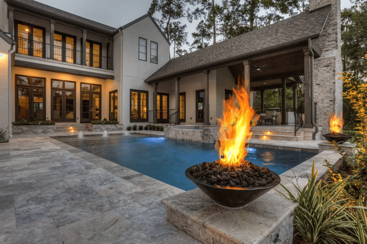 outdoor house with pool and fire pit